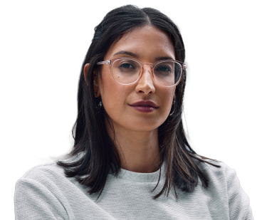 Image of woman with round-framed glasses and dark hair, wearing a gray sweater