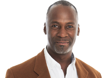 Image of man in a brown blazer and white button-up shir